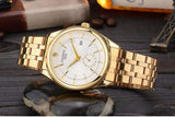 Close-up of a quartz watch with a leather strap