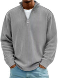 Grey corduroy casual quarter-zip pullover with vertical ribbed texture, stand collar, silver zipper and long sleeves