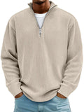 Men's beige corduroy casual quarter-zip pullover with ribbed texture, stand collar, silver zipper and long sleeves