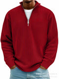 Men's red corduroy casual quarter-zip pullover with vertical ribbed texture, stand collar, silver zip and long sleeves