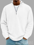 Men's white corduroy casual quarter-zip pullover with vertical ribbed texture, stand collar, silver zip and long sleeves