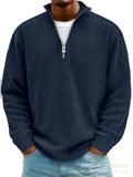 Men's navy blue corduroy casual quarter-zip pullover with vertical ribbed texture, stand collar and silver zipper