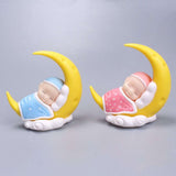 Moon Baby Sleeping Pillow with handmade quilt featuring crescent moon and sleeping baby for newborn nursery decor