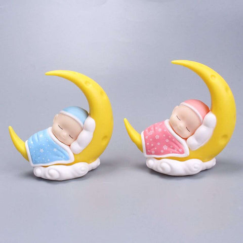 Moon Baby Sleeping Pillow with handmade quilt featuring crescent moon and sleeping baby for newborn nursery decor