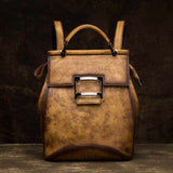 Vintage-inspired women's leather-look backpack in multiple colors
