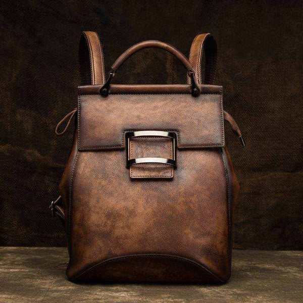 Vintage leather-look women's backpack with structured retro design and adjustable straps in multiple colors
