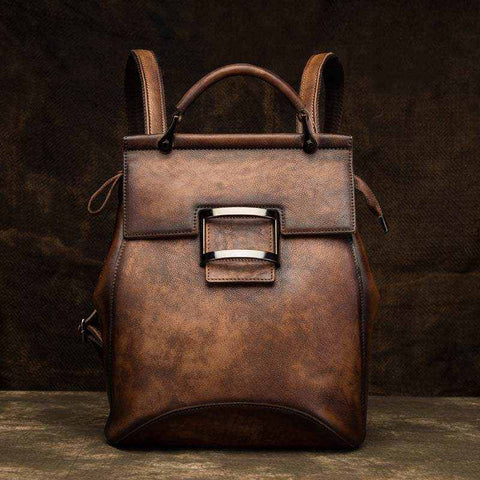 Vintage leather-look women's backpack with structured retro design and adjustable straps in multiple colors